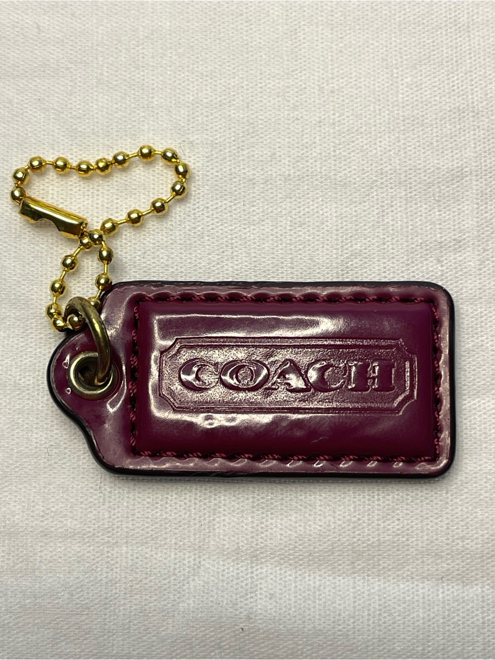 Coach Burgundy Leather Hang Tag with Gold Chain
